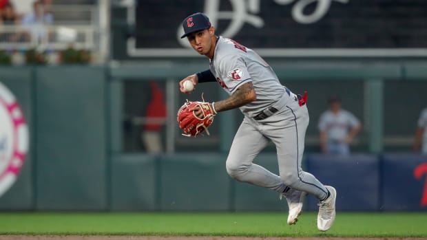 Jun 2, 2023; Minneapolis, Minnesota, USA; Cleveland Guardians shortstop Brayan Rocchio (6) fields a ball hit by the Minnesota Twins in the sixth inning at Target Field. Mandatory Credit: Bruce Kluckhohn-USA TODAY Sports